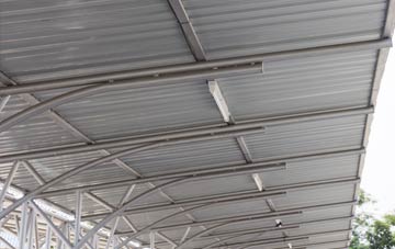 installing Bottom House metal roofing